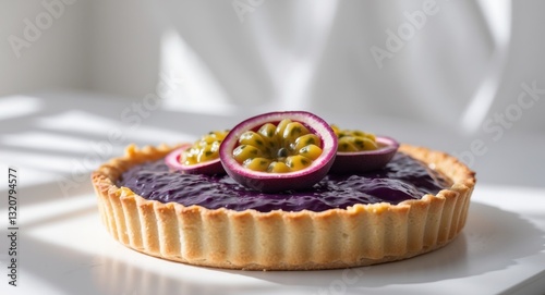 A Delectable Passion Fruit Tart with a Golden Crust. photo