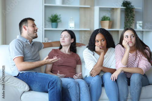 Принти на полотні Man talking and girls boring at home