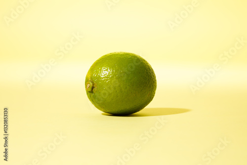Lime against yellow background