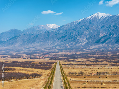 Road to the snow-capped mountains photo