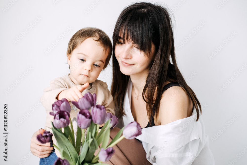 Mother and child sharing a tender kiss with tulips in hand. Mother's Day, family bonding, unconditional love, floral gift, motherhood moments.