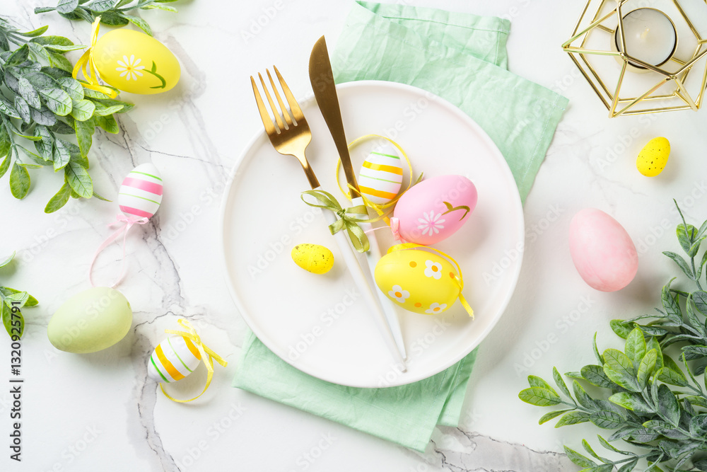 Easter table setting on white background.
