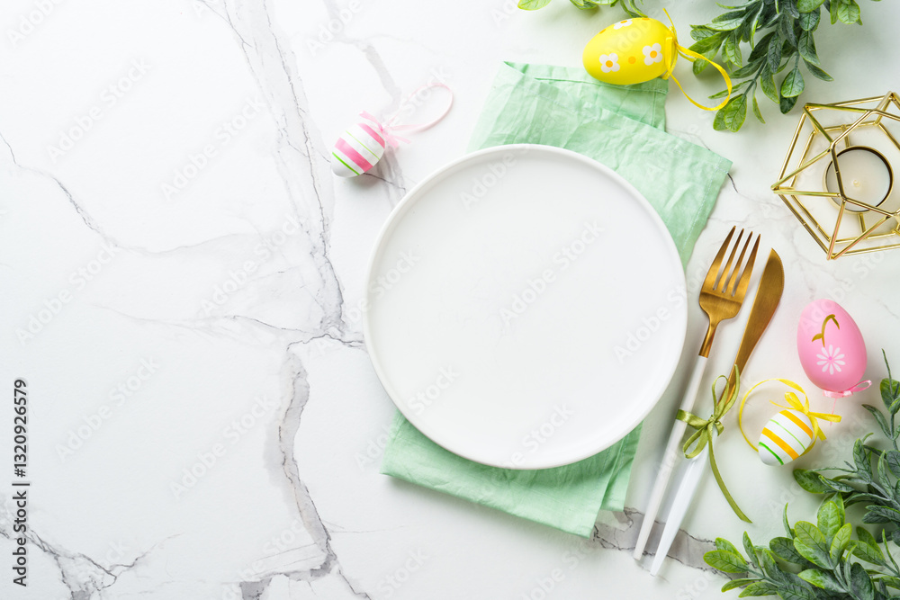 Easter table setting on white background.
