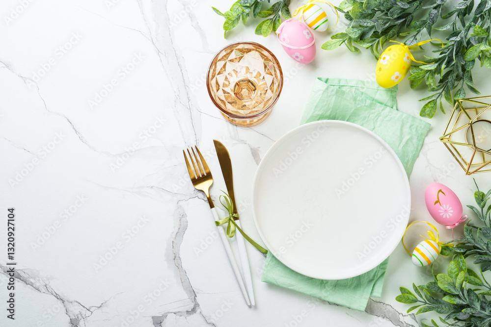 Easter table setting on white background.
