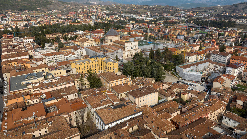 Obraz premium Aerial view of Basilica of San Bernardino located in the historic center of L'Aquila, Abruzzo, central Italy. 