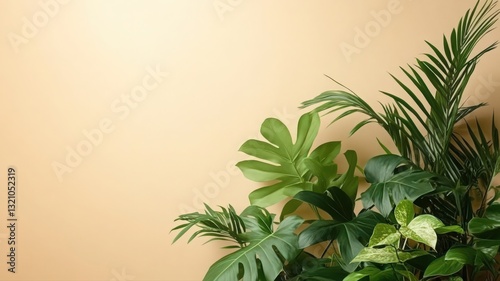 Lush Green Tropical Plants Against a Pale Beige Wall