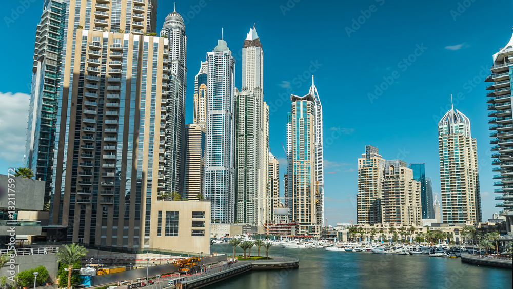 Obraz premium Dubai Marina towers and canal in Dubai timelapse hyperlapse