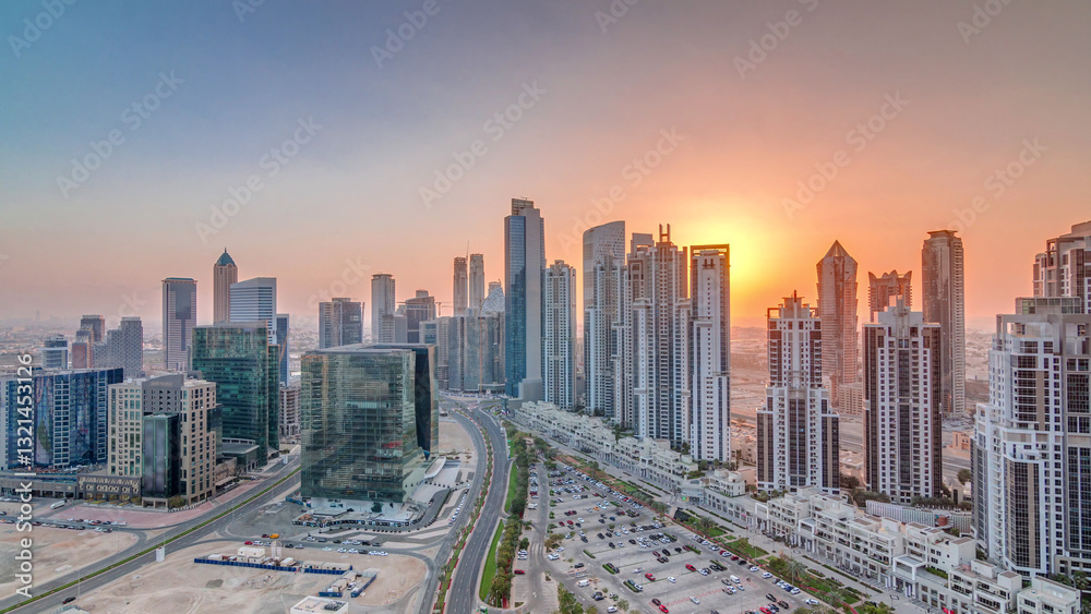 Modern residential and office complex with many towers aerial timelapse at Business Bay, Dubai, UAE. Modern residential and office complex with many towers aerial timelapse at Business Bay, Dubai, UAE.