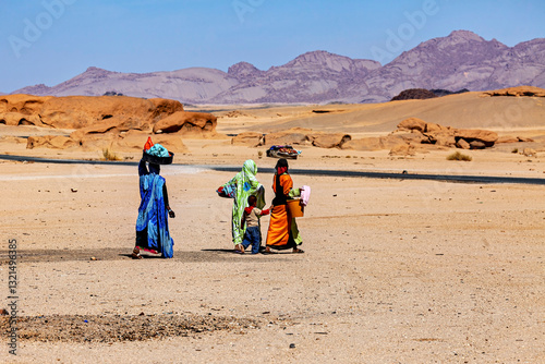 Women are cleaning and washing clothes in the sahara desert