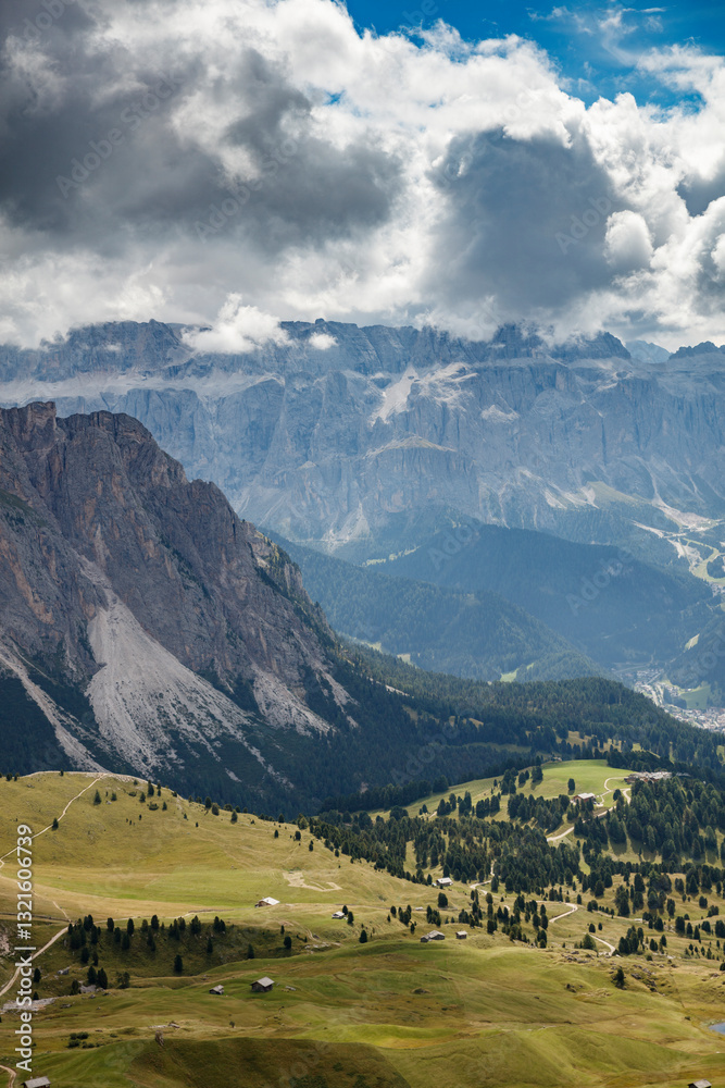 Expansive view of the Dolomites near Seceda showcasing dramatic mountain landscapes and lush valleys Expansive view of the Dolomites near Seceda showcasing dramatic mountain landscapes and lush valleys
