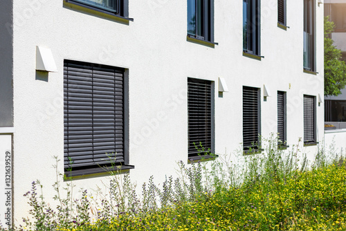 Blinds Outdoor Windows Roller Shutters of Modern Facade Building. Electric Shade Aluminium Louvre Awnings. 
