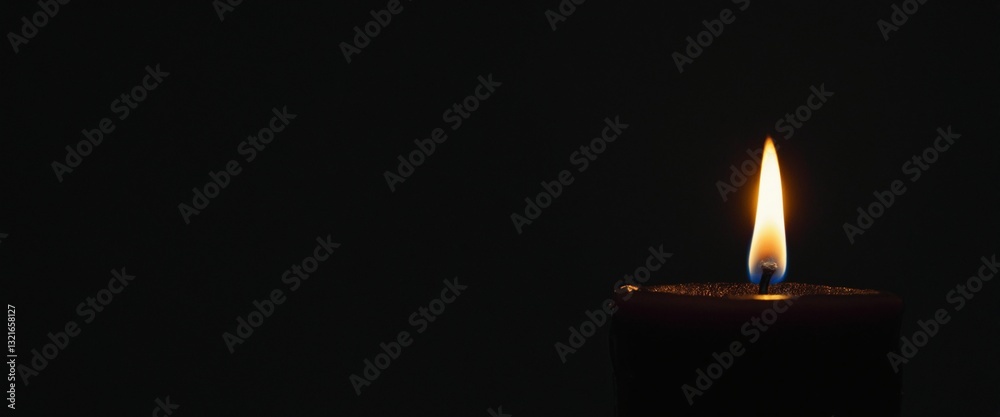 Burning candle. Symbol of light and hope. Banner with copy space.