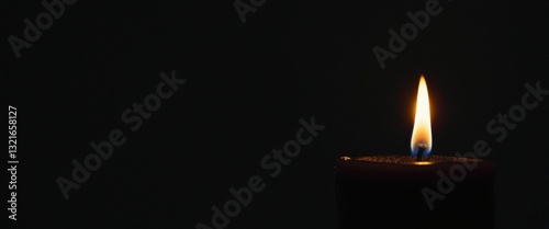 Obraz na płótnie Burning candle. Symbol of light and hope. Banner with copy space. w salonie