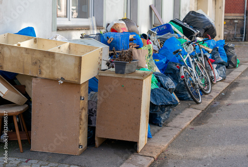 Household clearance for bulky waste with garbage bags on the street to be picked up