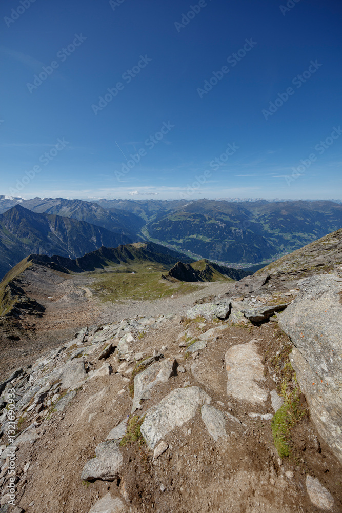 Breathtaking mountain view from Ahorn peak in Mayrhofen, Austria on a clear sunny day Breathtaking mountain view from Ahorn peak in Mayrhofen, Austria on a clear sunny day