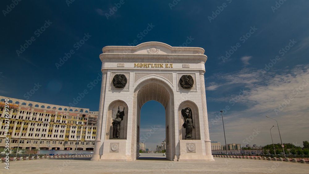 Obraz premium Triumphal arch timelapse hyperlapse and the central part of the city in Astana, Kazakhstan.