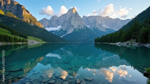 A crystal-clear mountain lake reflecting towering peaks, surrounded by lush greenery, creating a stunning mirror-like effect in a tranquil natural setting.