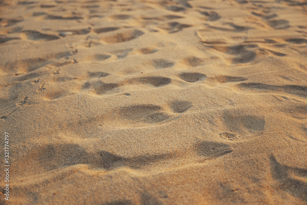 Texture of fine brown sand on the beach Texture of fine brown sand on the beach
