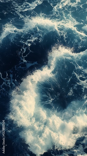 Waves Crashing Against the Ocean Surface Creating White Foam Patterns During ...