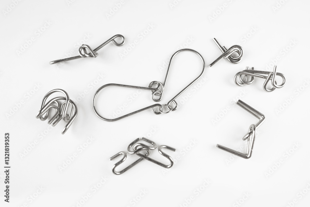 Wire Puzzles (Ring Puzzle) on White Background. Wire Puzzles (Ring Puzzle) on White Background.
