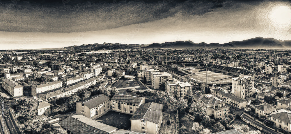 Pisa, Italy - Arena Garibaldi Stadium and city homes. Amazing panoramic aerial view at dawn