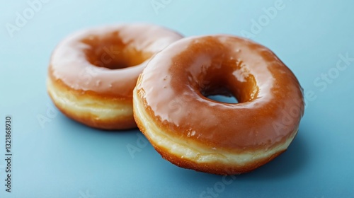 Glazed Donut Dessert on Blue Background - Sweet Pastry Image for Bakery Advertisements and Food Blogs