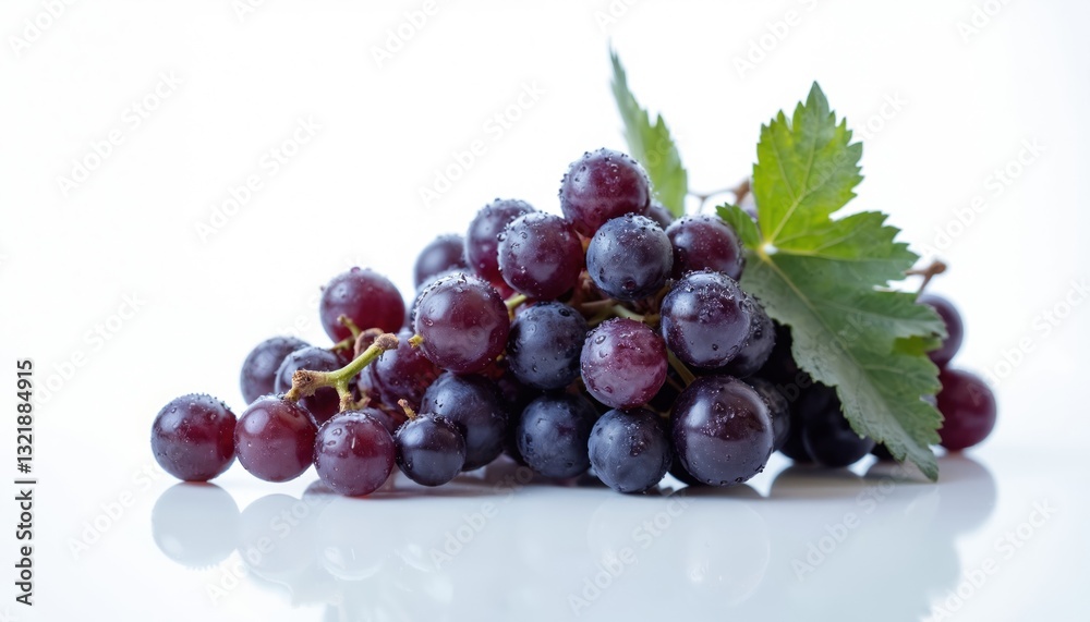 Close-up of fresh dark grape cluster with leaf. Healthy juicy dessert. Blue, purple, black grapes on white transparent background. Wine ingredient, fruit snack, vegetarian diet. Close-up of fresh dark grape cluster with leaf. Healthy juicy dessert. Blue, purple, black grapes on white transparent background. Wine ingredient, fruit snack, vegetarian diet.