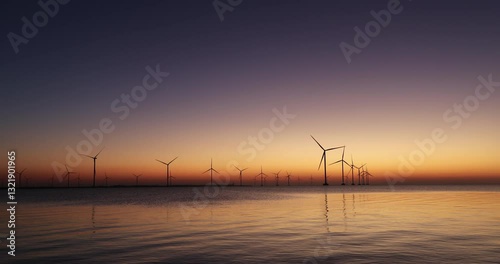 Wallpaper Mural Windturbines in the water during sunset. Producing alternative energy. Torontodigital.ca