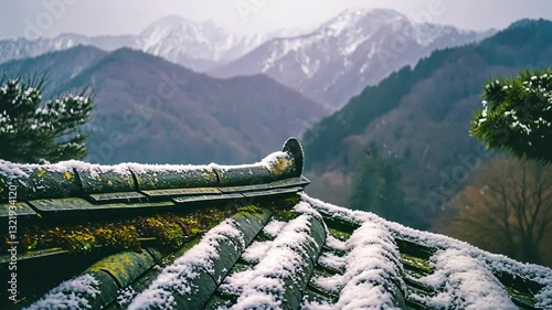 Snow blankets traditional rooftops with mountains in the distance during winter in a serene landscape