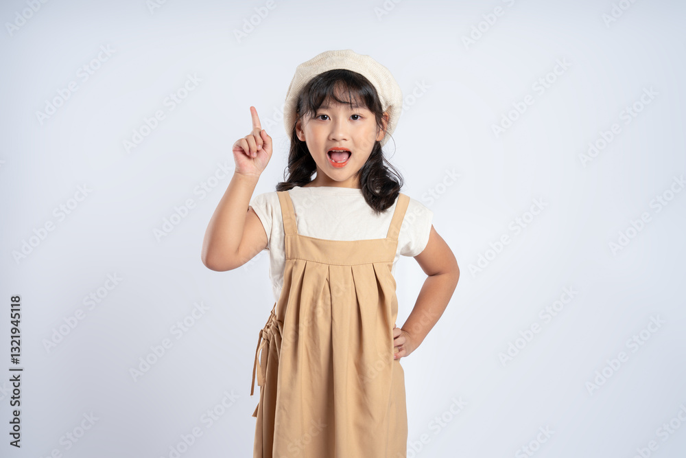 Portrait of beautiful Asian girl posing on white background, child Portrait of beautiful Asian girl posing on white background, child