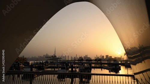 Captivating sunset over Dubai Creek Harbour with Dubai Business City skyline in the background