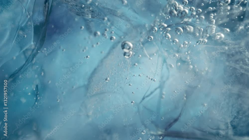 Super Slow Motion Shot of Ice and Air Bubbles in Crystal Clear Water at 1000fps.