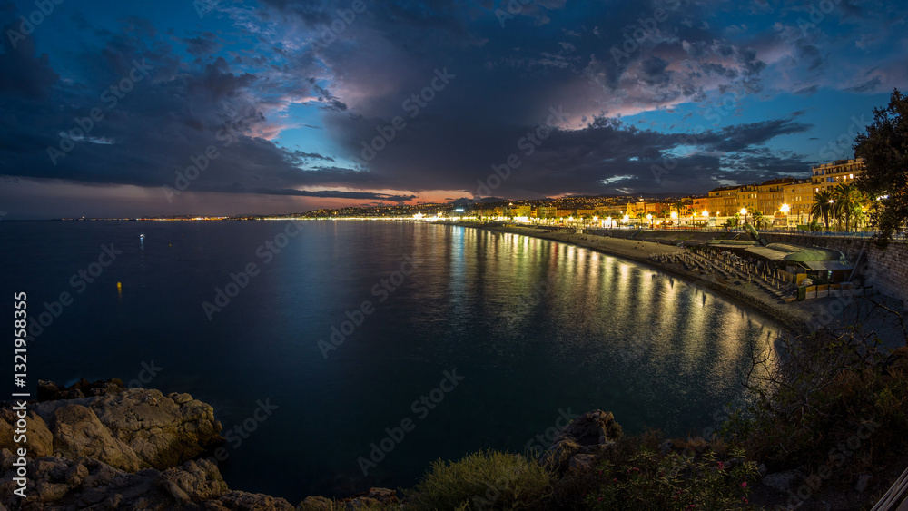 Fototapeta premium Waterfront of Nice city and Mediterranean Sea day to night timelapse