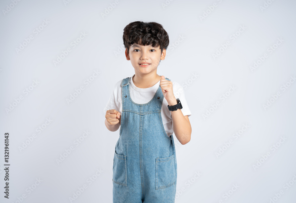 Portrait of beautiful Asian boy posing on white background, child Portrait of beautiful Asian boy posing on white background, child