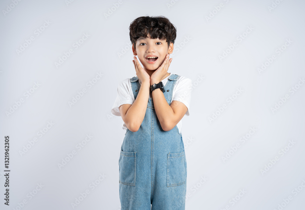 Portrait of beautiful Asian boy posing on white background, child Portrait of beautiful Asian boy posing on white background, child