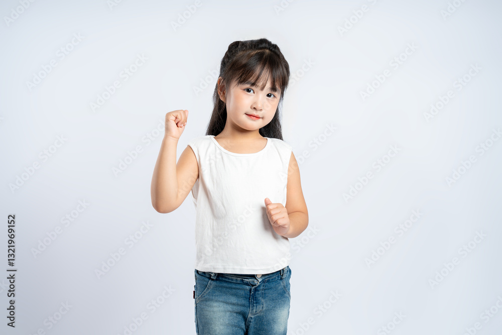 Portrait of beautiful Asian girl posing on white background, child Portrait of beautiful Asian girl posing on white background, child