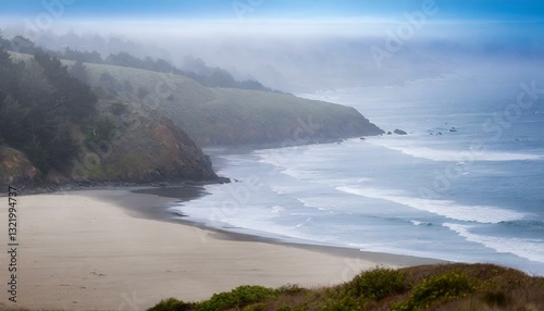 Gentle cliffs and a calm shoreline stretch beneath a hazy horizon, evoking a sense of tranquil coastal beauty.