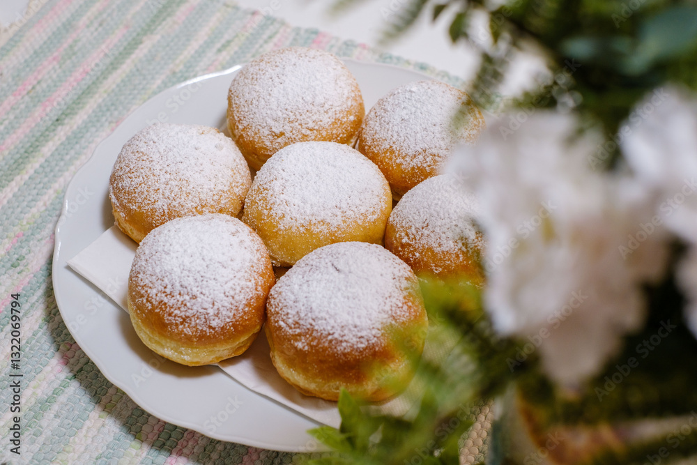 Fresh baked homemade donuts on the table