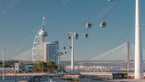 Obraz na plátně Promenade area of River Tagus in park of nations district timelapse hyperlapse, Vasco da Gamma Bridge