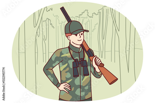 Man hunter with double-barreled gun stands in forest with binoculars to track down wild animal and search for prey. Gamekeeper guy protects animals from national park from hunter or poacher