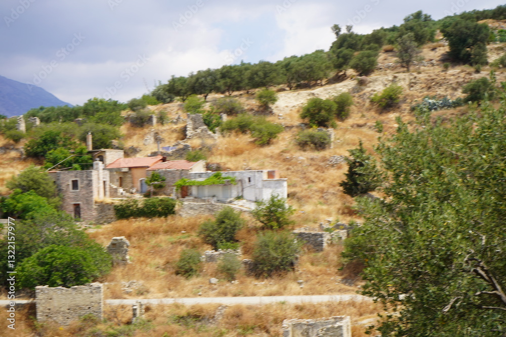 High view of the village of Raftis, abandoned since the 1960s, built by the Venetians around 1400, later served as an observatory for the Turks due to its location - Beautiful natural landscape High view of the village of Raftis, abandoned since the 1960s, built by the Venetians around 1400, later served as an observatory for the Turks due to its location - Beautiful natural landscape