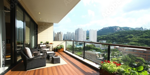 A balcony featuring outdoor furniture with a scenic city view
