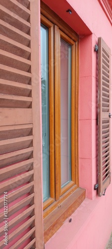 colorful window with shutters