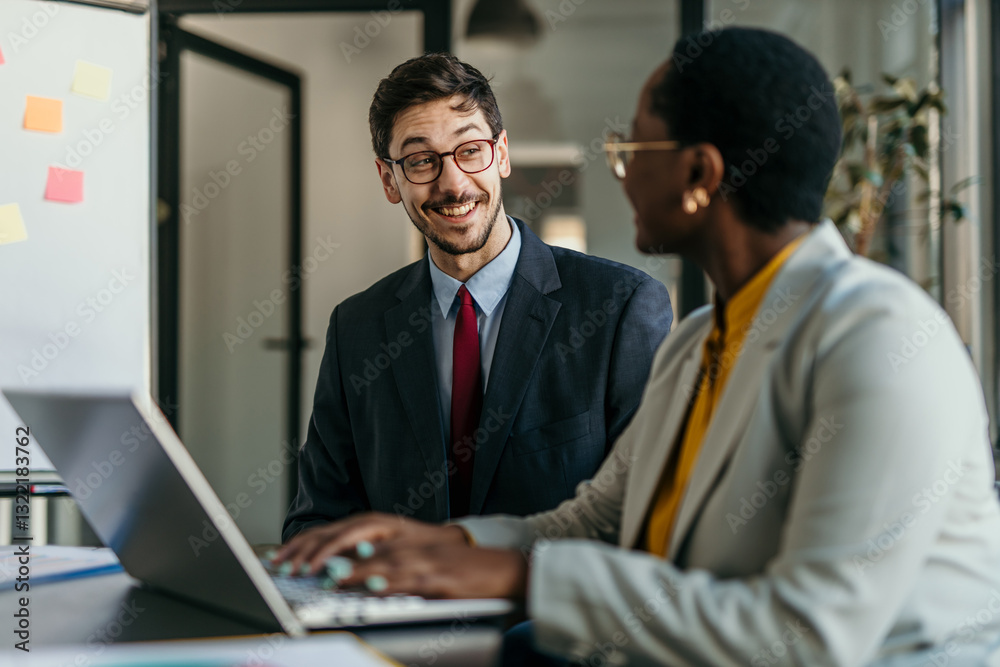 Professional team reviewing documents and discussing company growth Professional team reviewing documents and discussing company growth