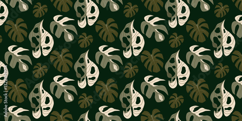 Seamless pattern with Monstera leaves. Tropical exotic dark background with green and beige foliage. Modern vector illustration in flat style for fashion prints, textile, wallpaper, interior design