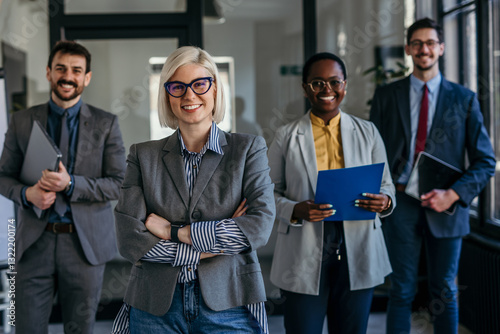 Portrait of a group of diverse business people having a meeting in the office. Teamwork and success concept