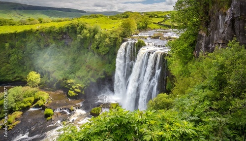 Majestic waterfall surrounded by greenery