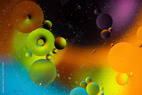 Colorful Background. Gold and green paint bubbles create a matching abstract background.