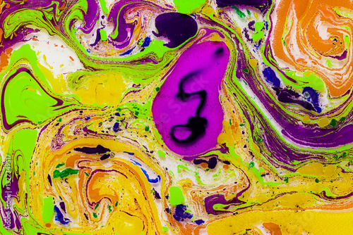 Colorful abstract marbling pattern with vibrant swirls photo