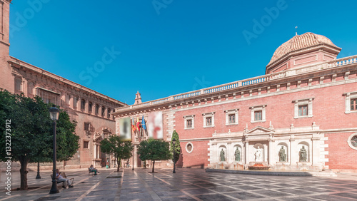 Tableau sur toile Patriarch's College Square in Valencia timelapse, featuring fountain with sculptures